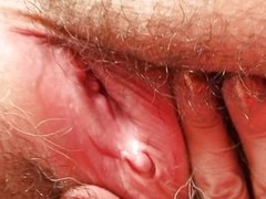 This grandma with big tits is housebound on the couch and lose concentration babe is playing with her hairy pussy. That babe is gaping her wet slit showing even so big and deep is the inside part of it. That babe have a good to lick clitoris. The granny d